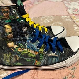 Women’s size 7 Green Arrow High Top Converse